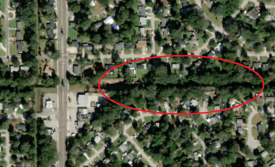 An aerial view of a neighborhood Description automatically generated