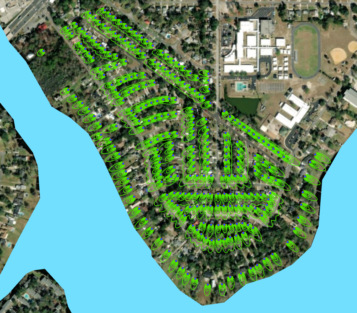 A satellite view of a neighborhood Description automatically generated